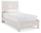 White panel bed with carved-look headboard, straight footboard, and slatted frame