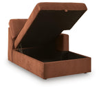 Spice-brown corner chaise with storage, open lid showing dark interior.