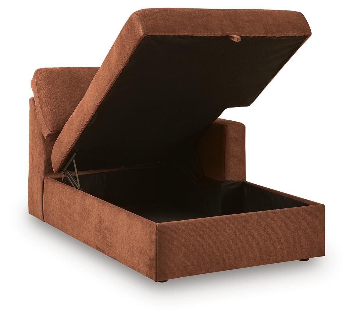 Spice-brown corner chaise with storage, open lid showing dark interior.