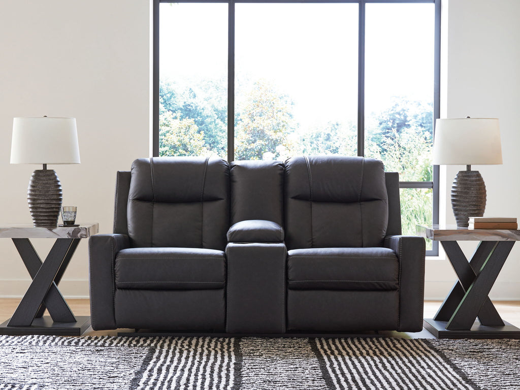 Black double reclining loveseat with center console and plush headrests for lounging