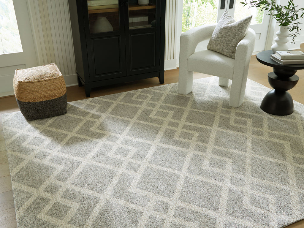 Gray geometric rug with repeating diamond pattern, square corners