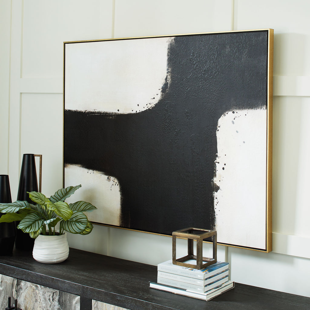 Framed abstract wall art with black-and-white cross design