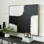 Framed abstract wall art with black-and-white cross design