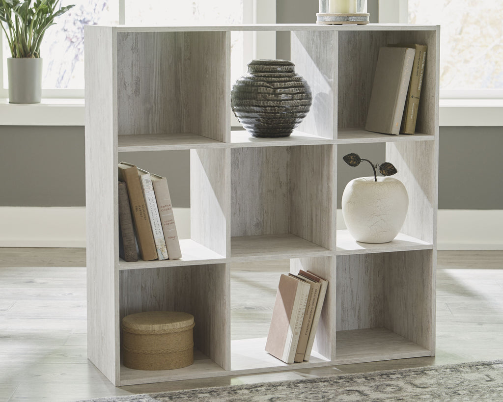 White cube organizer with open square compartments shelving unit