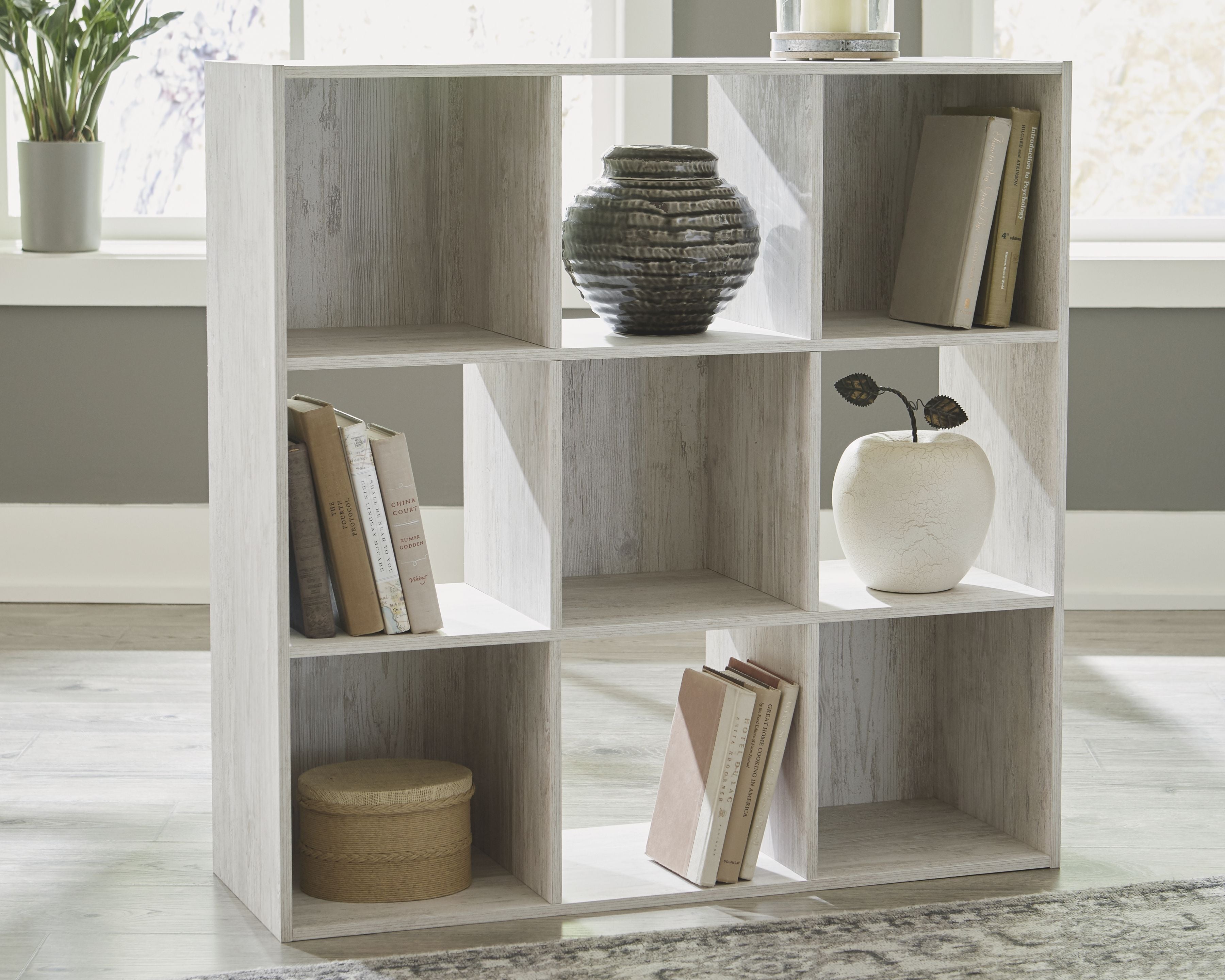 White cube organizer with open square compartments shelving unit