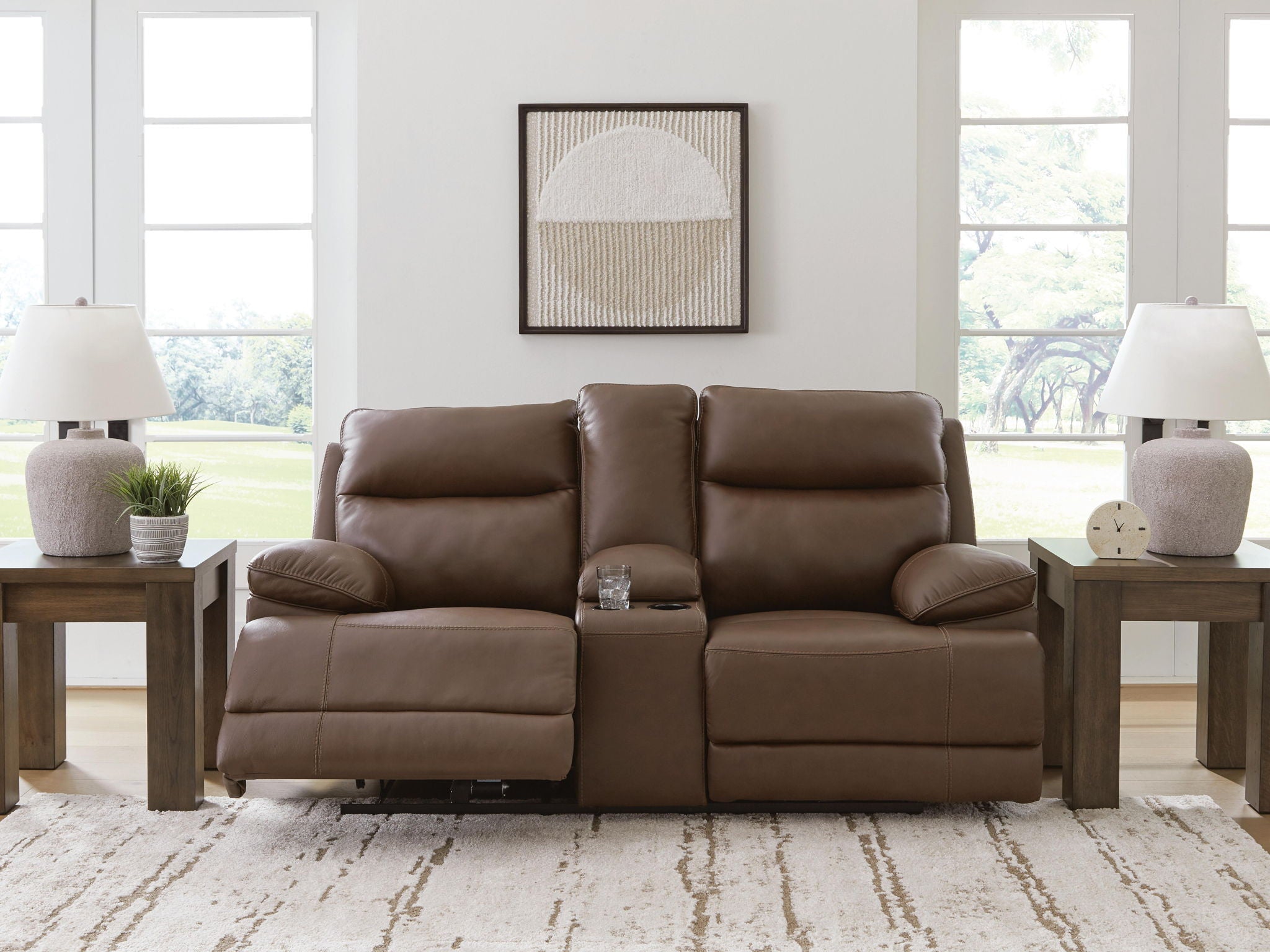 Power reclining loveseat with console and adjustable headrests, dark brown leather cushions