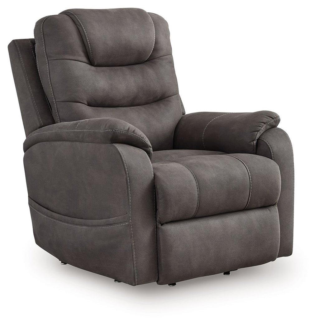 Gunmetal power lift recliner with curved armrests, thick back cushion, smooth upholstery.