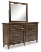 Brown wooden dresser with framed mirror and six drawers with metal knobs