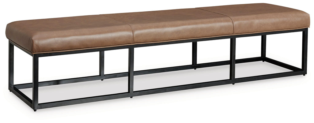 Caramel brown bench cushion on black metal frame with open lower shelf