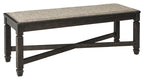 Upholstered bench with beige-gray fabric top and dark wood X-style support