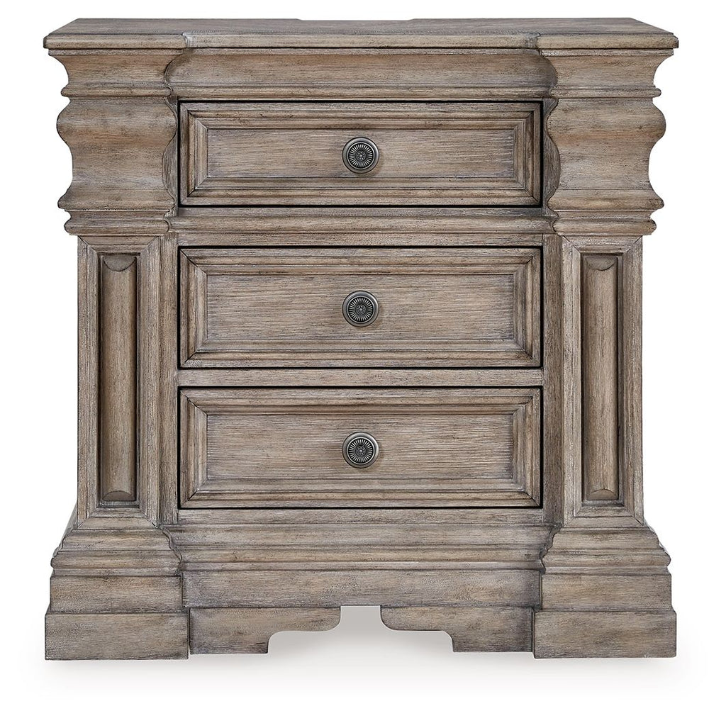 Three-drawer night stand front view, light grayish brown wood with three round knobs