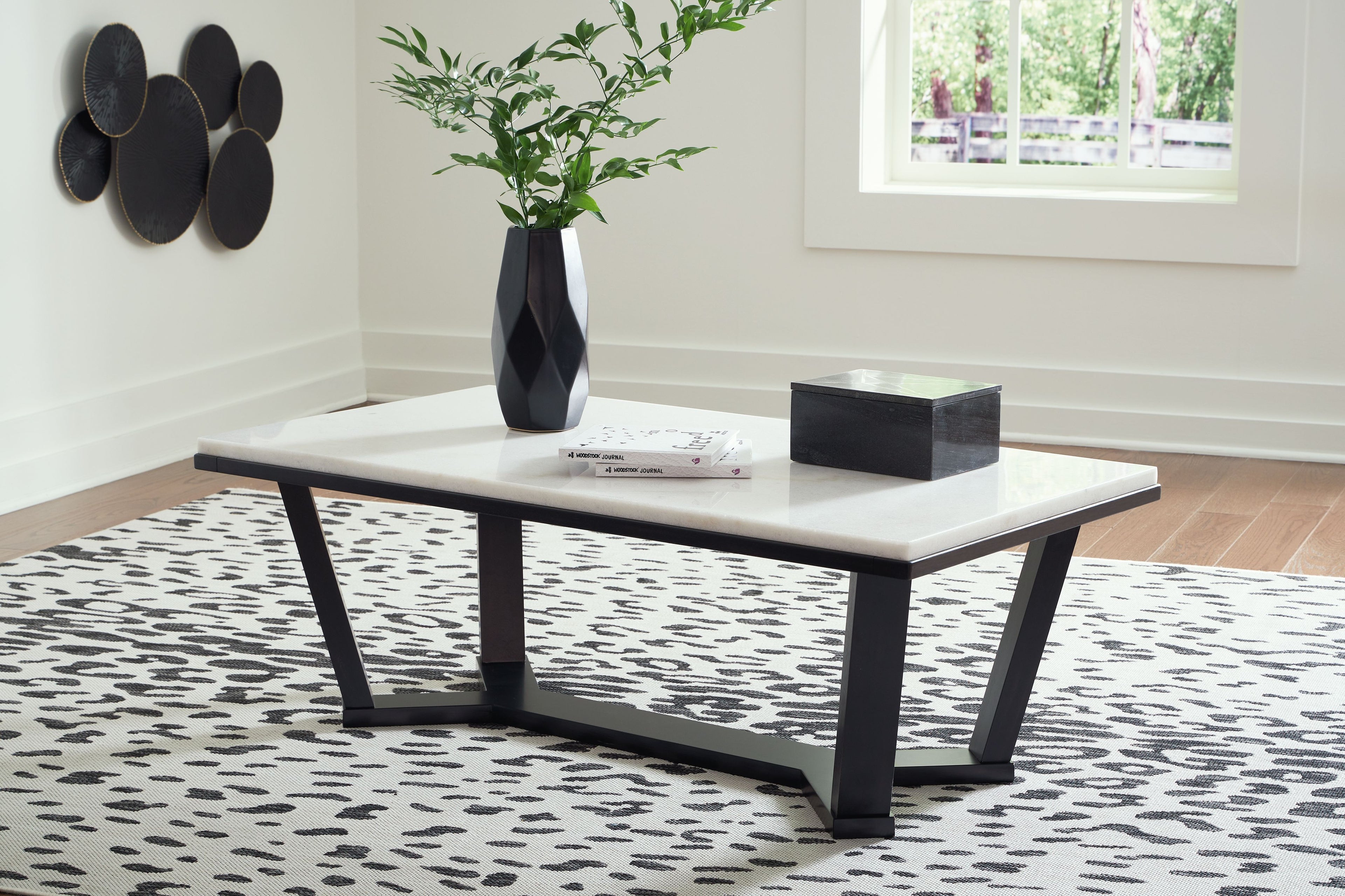 Rectangular cocktail table with white top and dark espresso legs, modern design