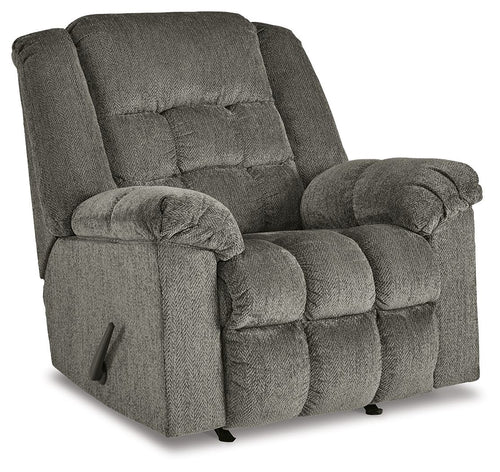 Gray rocker recliner chair with tufted back, padded arms, side control handle