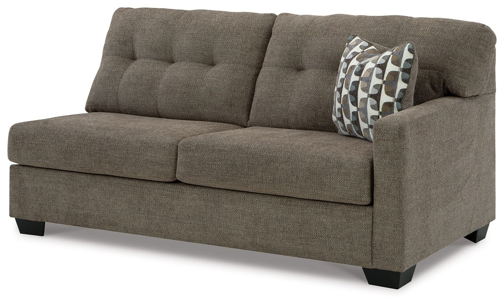 Fabric sofa sleeper with three seat cushions and square arms, dark gray with patterned pillow