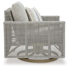 Gray swivel lounge chair with woven back, seat cushion, and striped throw pillow