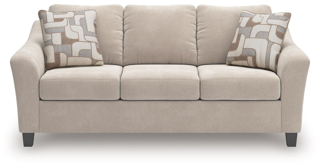 Taupe queen sofa sleeper with three front cushions and two patterned accent pillows