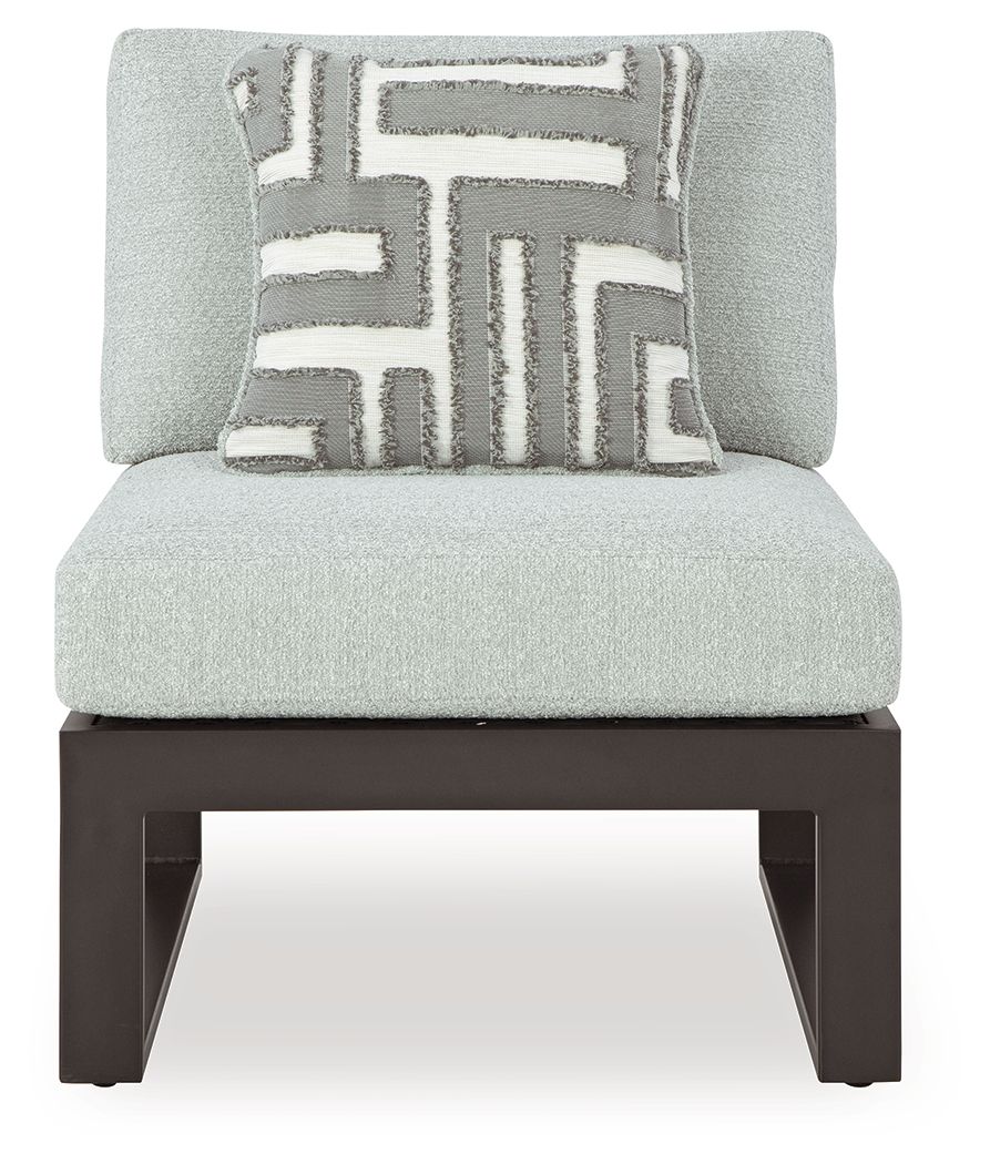Outdoor sectional chair seat with light gray back cushion, geometric pillow, black frame