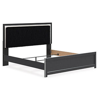Upholstered panel headboard with ribbed black panel and dark side rails