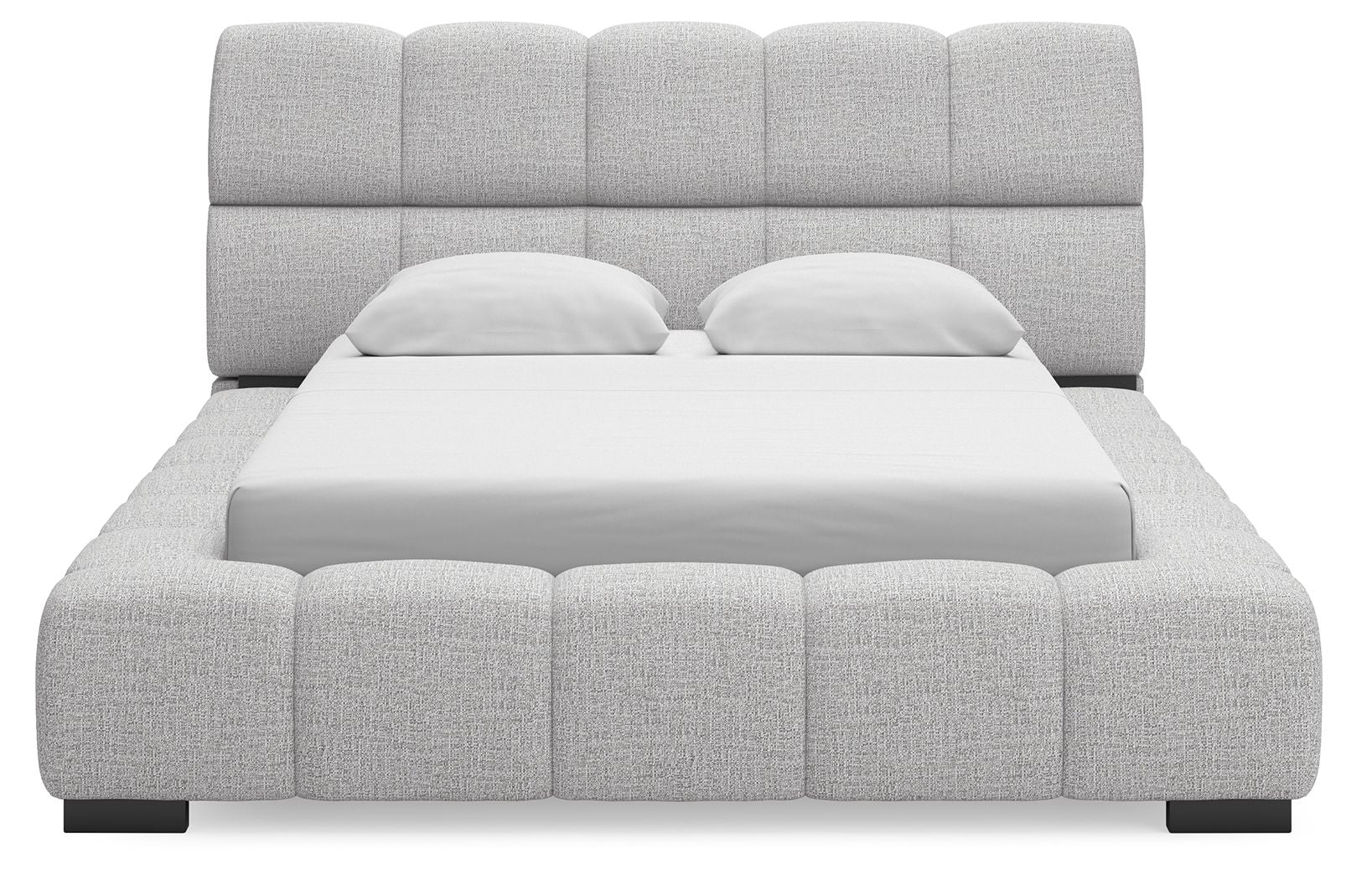 Gray upholstered bed with tall padded headboard and blocky tufted frame, front view