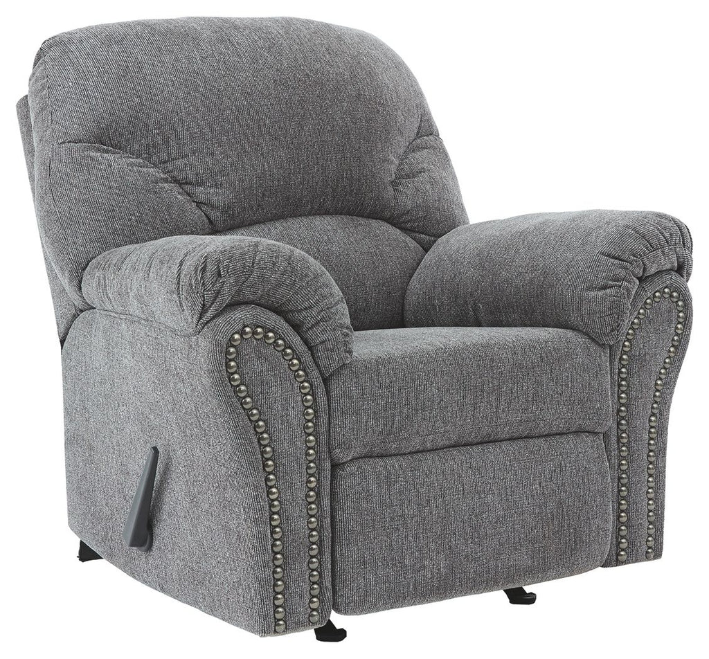Pewter fabric rocker recliner, padded arms, nailhead trim, and recline footrest