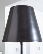 Black metal drum lamp shade with curved shape and smooth surface
