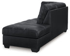 Right-arm corner chaise with dark charcoal upholstery, tufted seat, and curved armrest