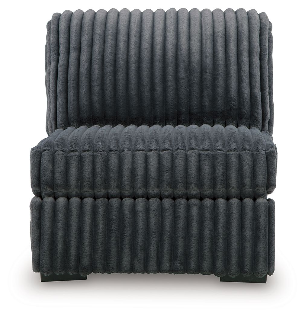 Gunmetal armless chair with stacked padded back and seat, ribbed quilted texture
