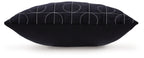 Dark fabric pillow with stitched curved circle pattern and neat piping