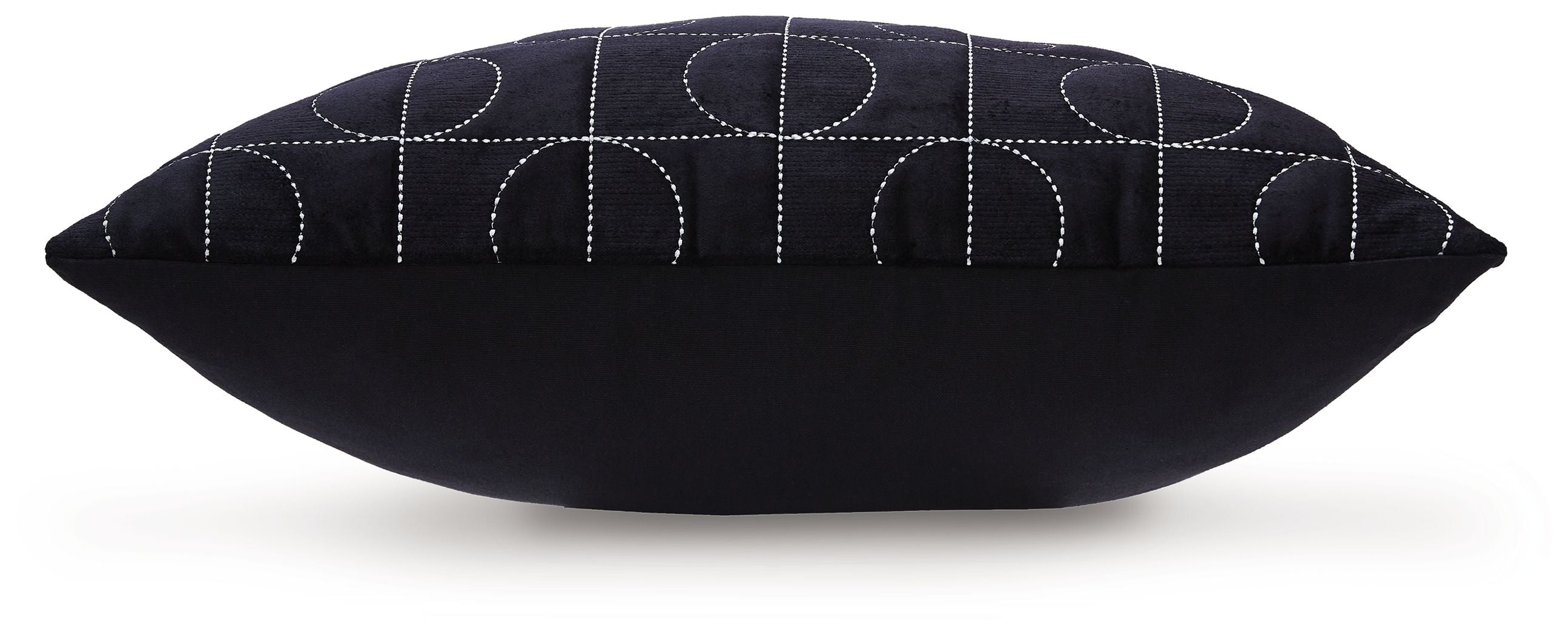 Dark fabric pillow with stitched curved circle pattern and neat piping