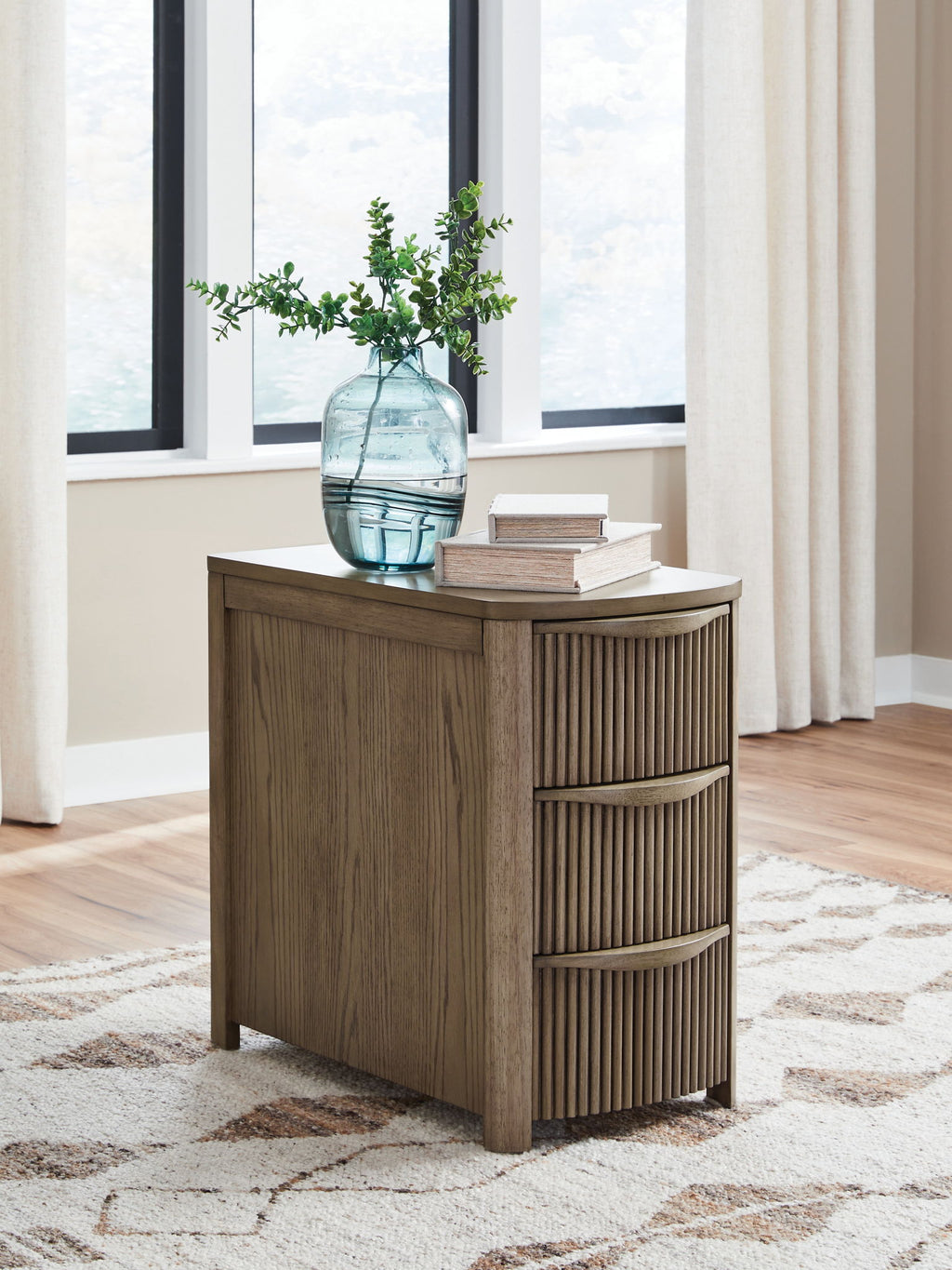 Dark brown chair side end table with ribbed cabinet doors and lower shelf