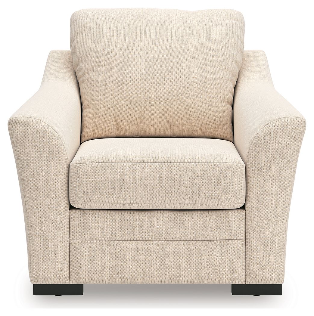 Beige upholstered recliner chair with padded back, seat, and low black base feet