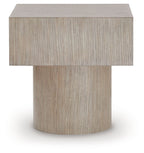 Light brown square table with flat top and cylindrical pedestal base