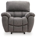 Gray power rocker recliner front view with padded arms, quilted seat, adjustable headrest