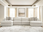 Beige sectional sofa with chaise ends and row of back pillows
