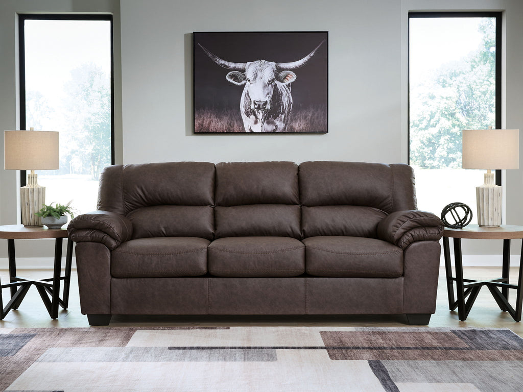 Dark brown 3-seat sofa with tufted back and padded armrests