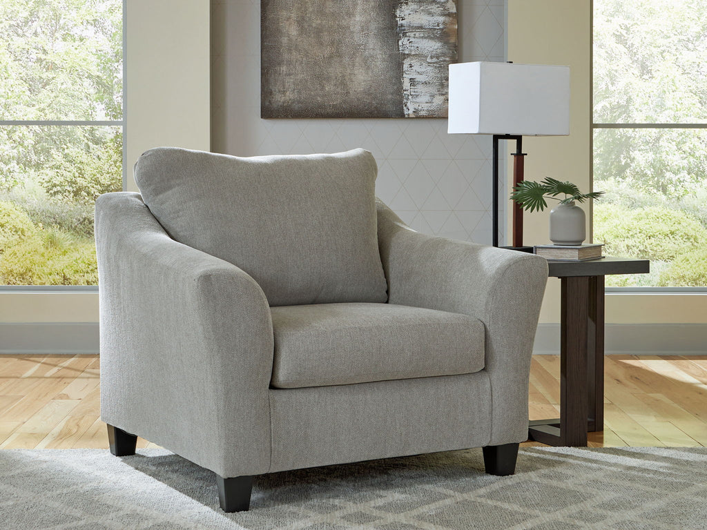 Taupe chair-and-a-half armchair with rounded arms and high back cushion, dark legs