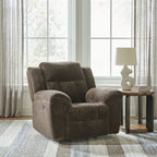 Chocolate fabric rocker recliner chair with tufted back and extended footrest