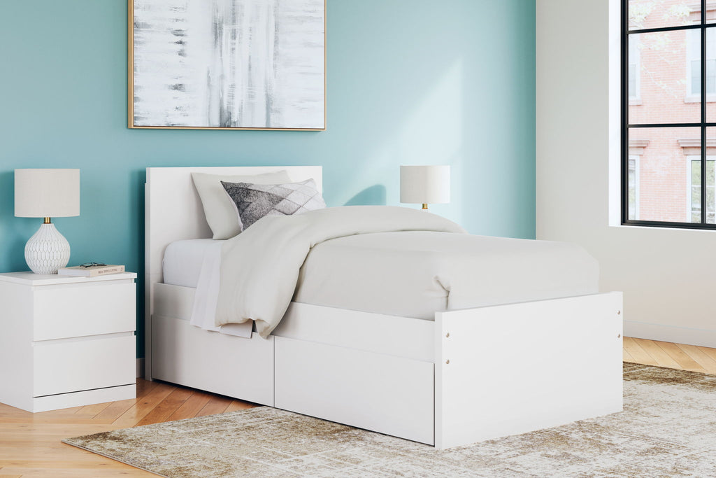 White panel platform bed with slatted base and low side rails