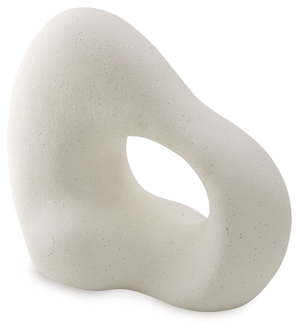 Off-white abstract sculpture with oval cutout and smooth rounded surface