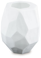 White faceted ceramic vase with open top and geometric faceted sides