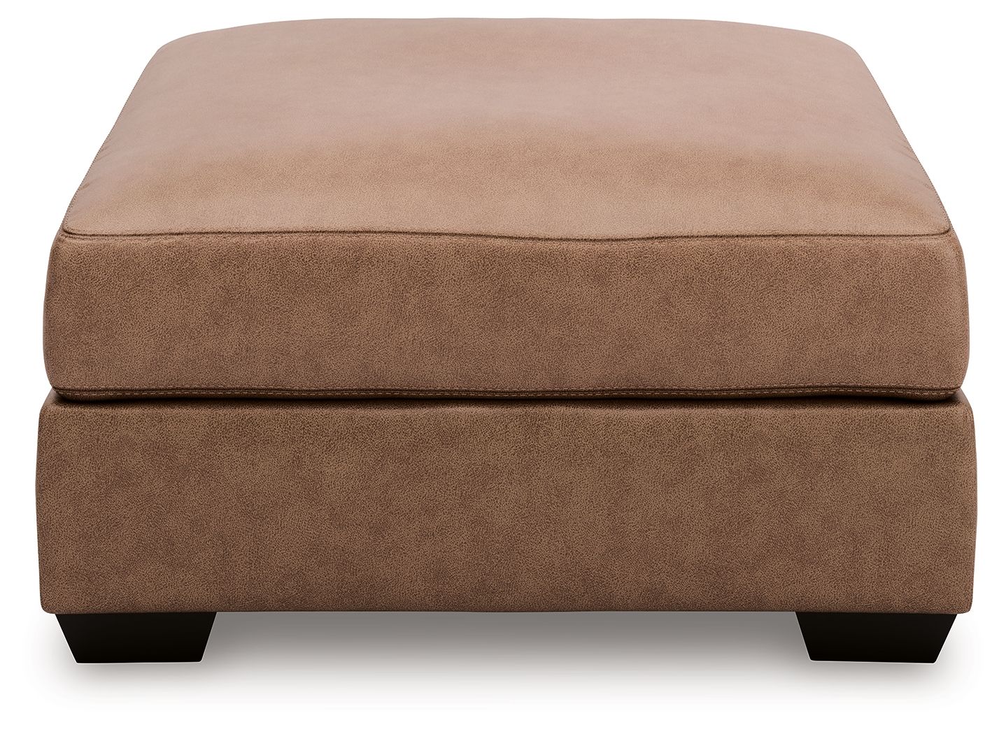 Oversized accent ottoman in tan upholstered fabric with low block legs