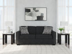Coal fabric sofa with nailhead trim, three back cushions, and two heather gray pillows