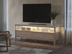 Beige TV stand with open center shelf, two drawers, and gray cabinet doors