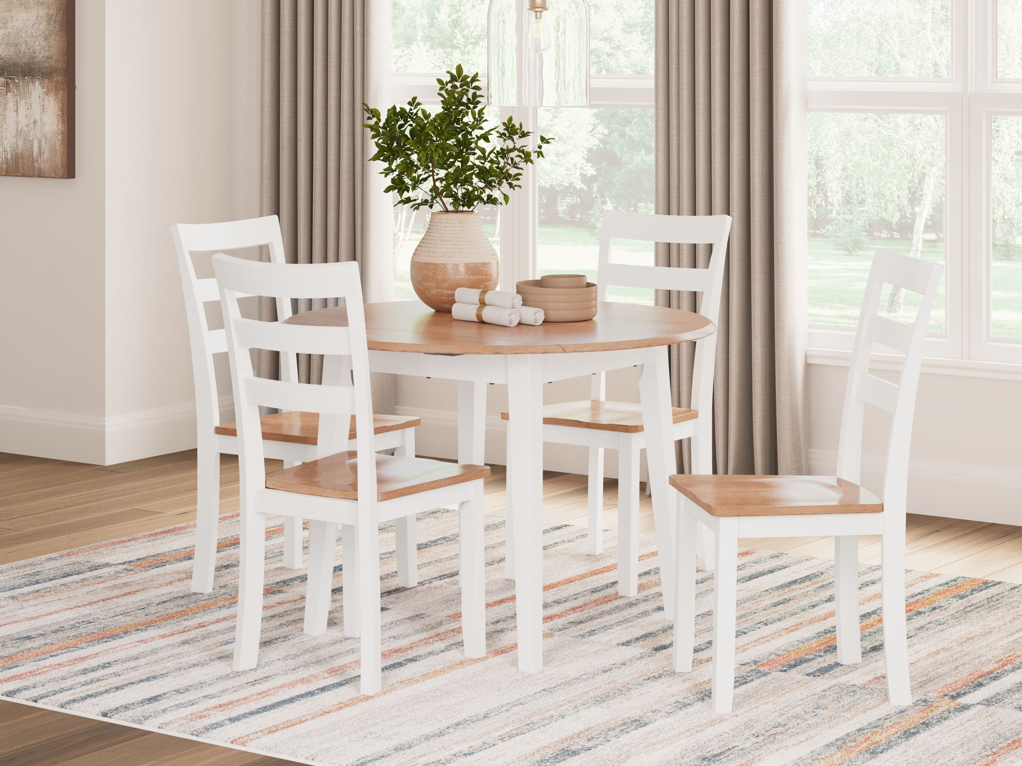 White round drop-leaf dining table set with four chairs, 5-piece
