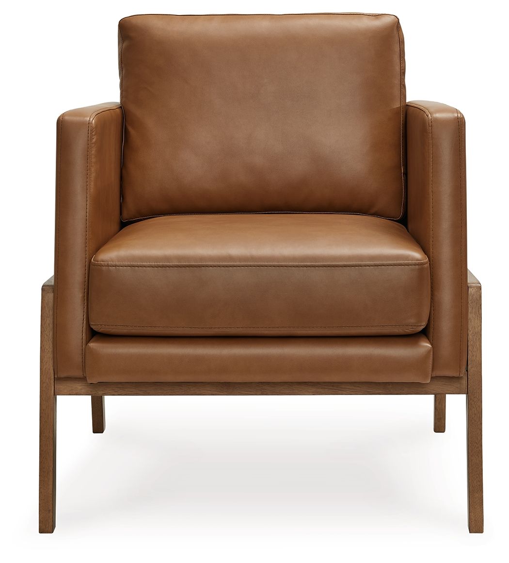 Caramel leather-look accent chair with wide arms, thick seat, and straight wooden legs