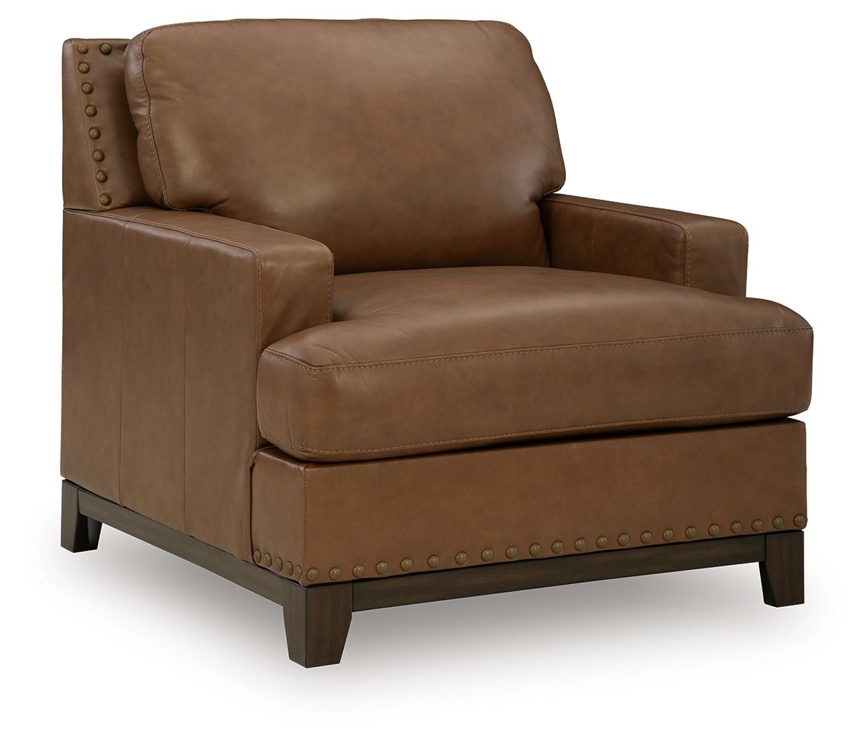 Amber leather armchair with nailhead trim, padded arms, and short wooden legs
