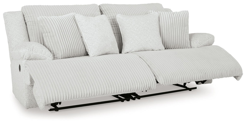Light reclining sectional sofa with extended footrests and striped seat cushions