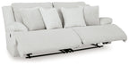 Light reclining sectional sofa with extended footrests and striped seat cushions