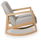 Gray fabric accent chair with curved wooden rocker base, angled view