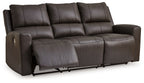Boxmere dark brown power reclining sofa with reclined seat and padded arms